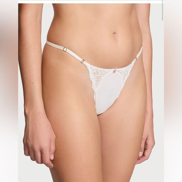 NWT- DREAM ANGELS
Lace-Trim Adjustable V-String Panty- size Medium - Picture 1 of 7